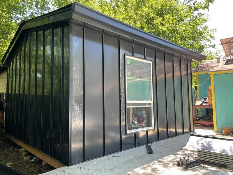 Black standing seam metal wall panels for Roof Inspection in Cedar Hill