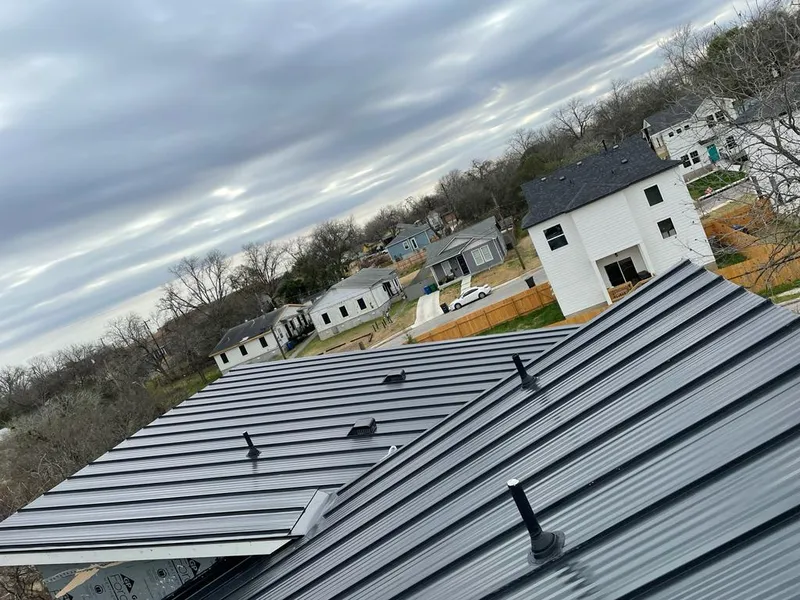 Standing seam metal roof panels with vents for Skylight Repair in Cedar Hill